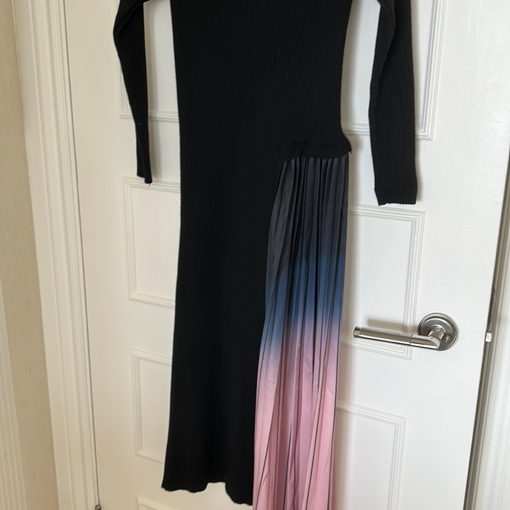 Ribbed dress with side embellishments